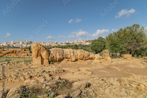 Giant Telamon  Atlas supporting statue of ruined Temple of Zeus in the Valley of Temples of Agrigento  Sicily  Italy.