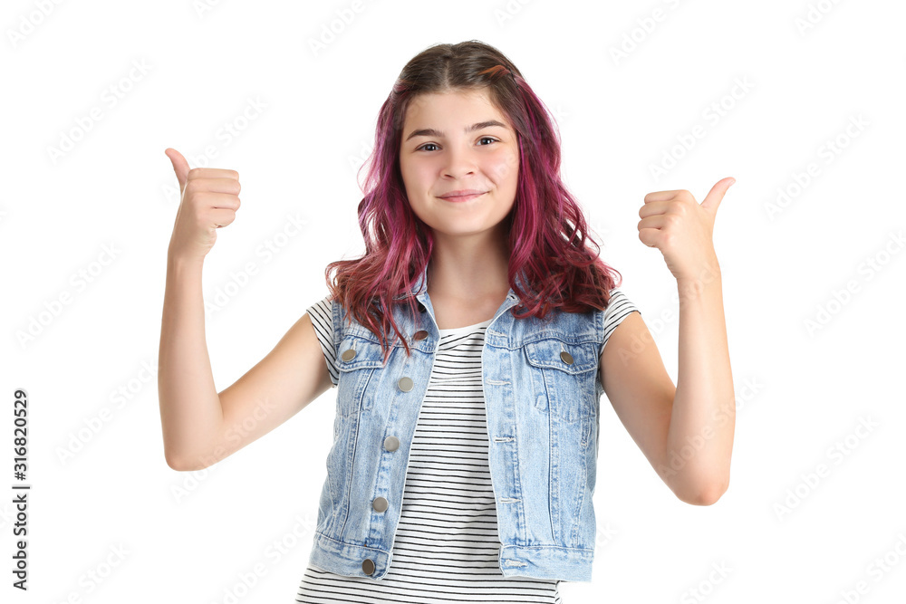 Beautiful young girl showing thumbs up on white background Beautiful young girl showing thumbs up on white background