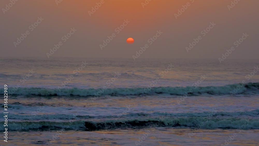 Atlantic Ocean waves at sunset at Terrace Bay in the Skeleton Coast National Park in Namibia in Africa. Atlantic Ocean waves at sunset at Terrace Bay in the Skeleton Coast National Park in Namibia in Africa.