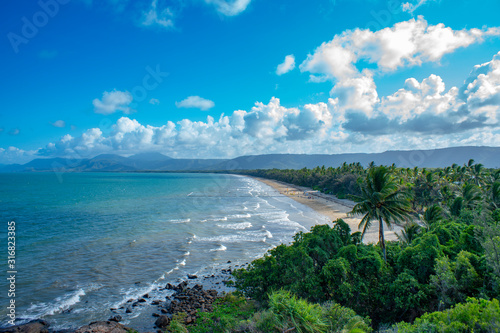 Port Douglas Four Mile Beach in Tropical North Queensland close to Daintree Rainforest National Park, Australia. photo