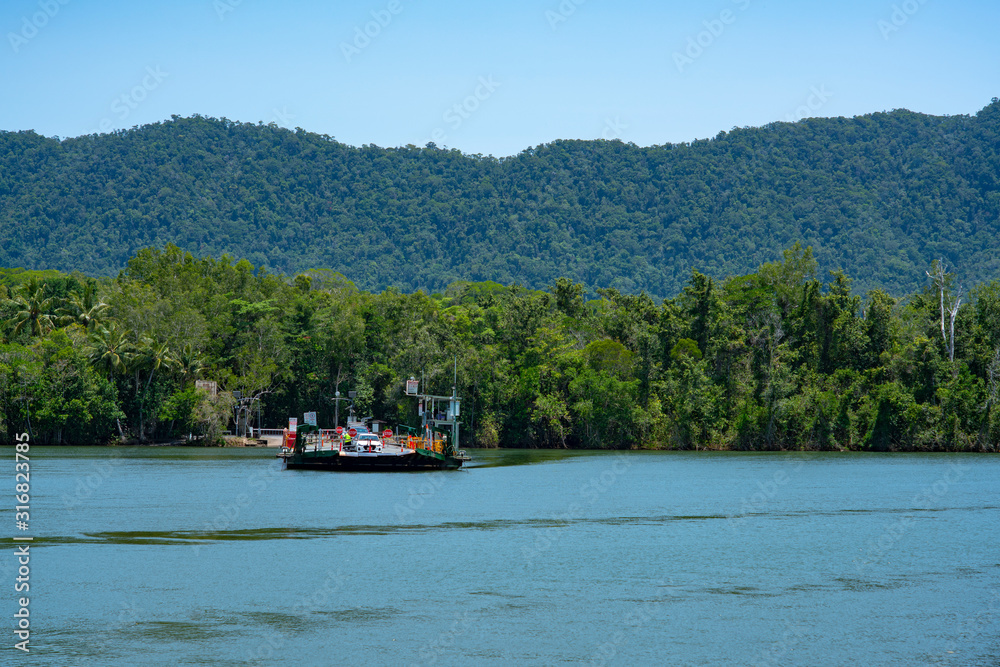 Port Douglas Australia - December 25, 2019: Daintree Ferry On Daintree River Christmas Day. The Cable Ferry is the only road Access to Cape Tribulation in Far North Queensland, Australia.