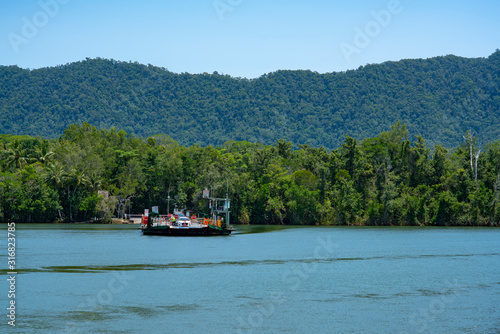 Port Douglas Australia - December 25, 2019: Daintree Ferry On Daintree River Christmas Day. The Cable Ferry is the only road Access to Cape Tribulation in Far North Queensland, Australia.