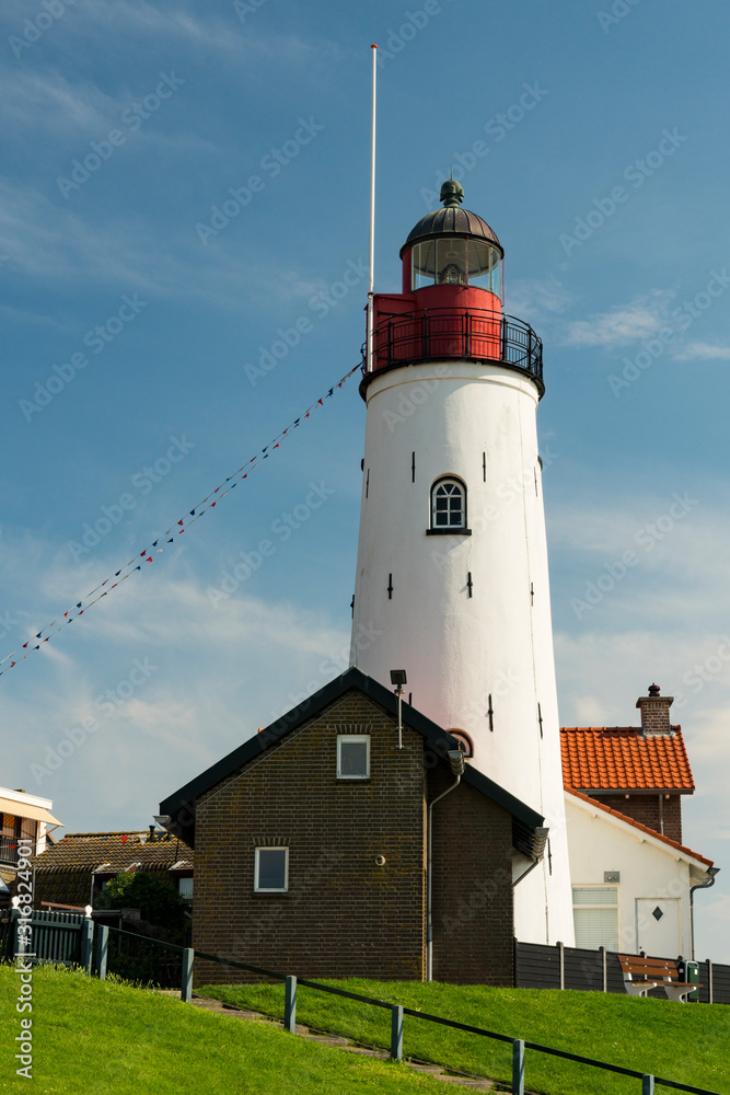 Lighthouse of  Urk,  against blue sky. The Netherlands.