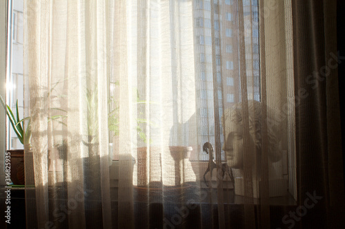 interior- composition of items on the windowsill on a sunny day
