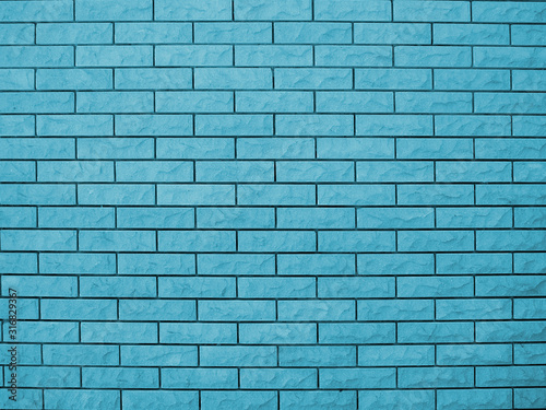 Brick wall closeup in blue, background, texture