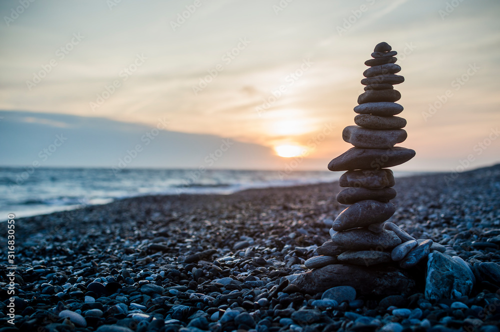 Obraz premium stack of stones on the beach