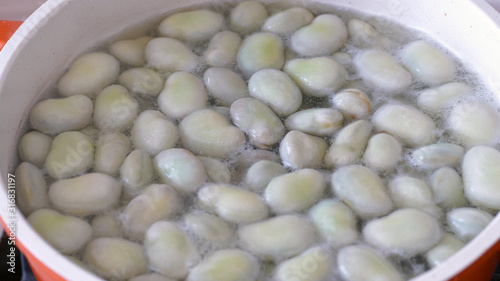 Cooking fava beans in water with salt. Fava beans also caled broad beans