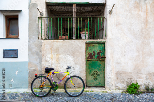 Procida (Italy) - Colored walls and bike in Procida, a little island in Campania, southern Italy