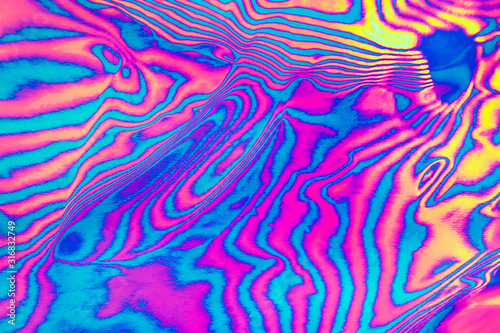 Abstract trendy neon colored psychedelic fluorescent striped zebra textured neon background © Aleksandra Konoplya