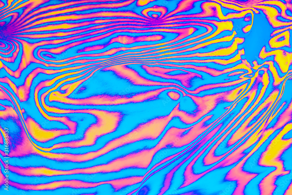 Abstract trendy neon colored psychedelic fluorescent striped zebra textured neon background
