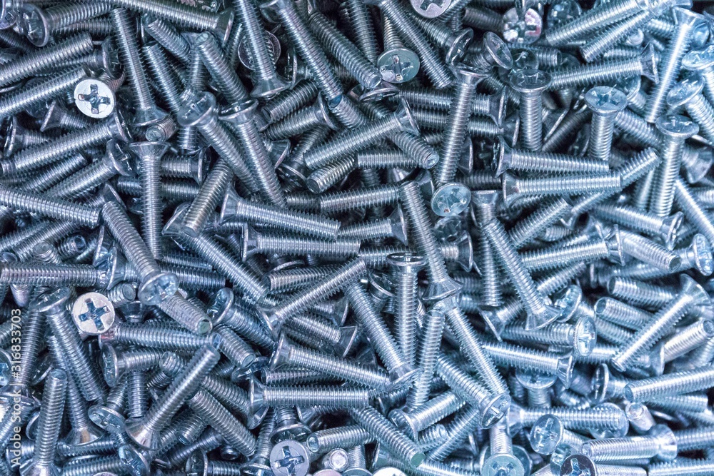 Metal Bolts top view close-up. background texture, filled frame. Metal Bolts top view close-up. background texture, filled frame.