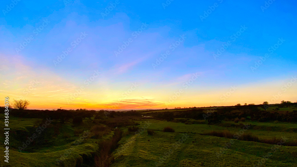Panoramic view across Bodmin Moor, Cornwall, UK winter sunset