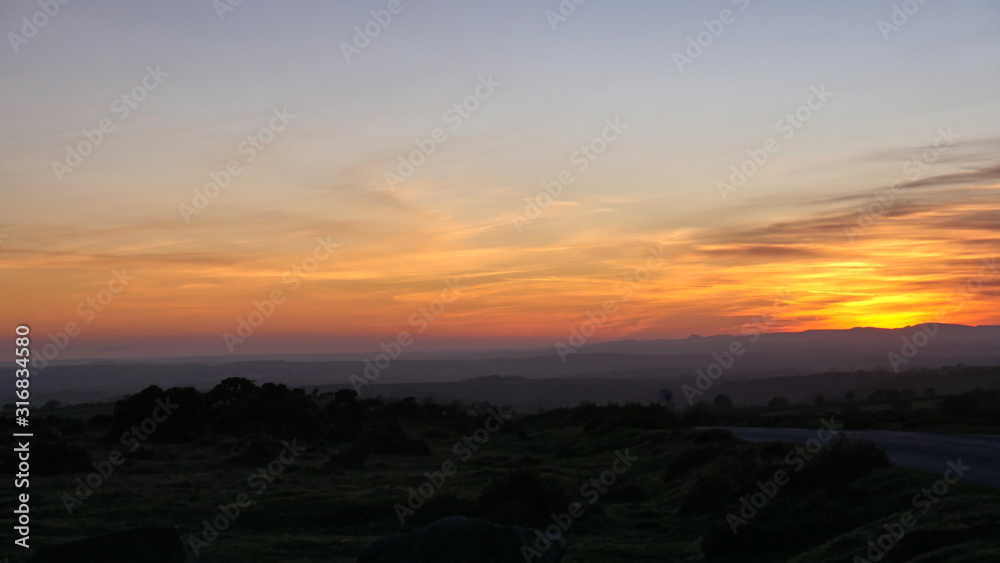 Winter sunset across a west country moorland