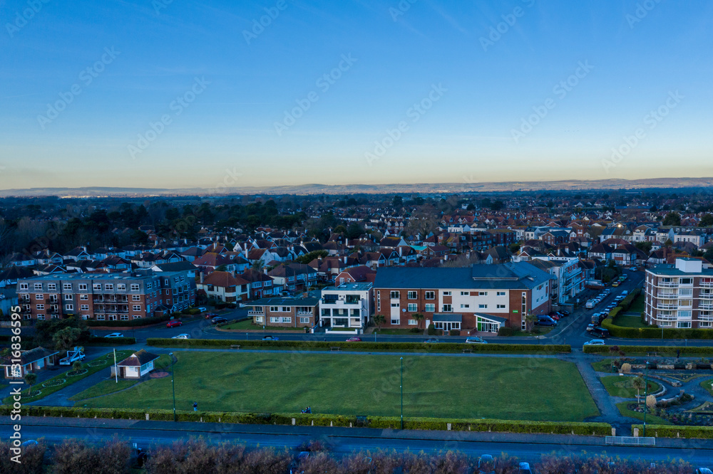 Bognor Regis aerial view looking towards Marine Park Gardens with clear calm conditions over the town. Bognor Regis aerial view looking towards Marine Park Gardens with clear calm conditions over the town.