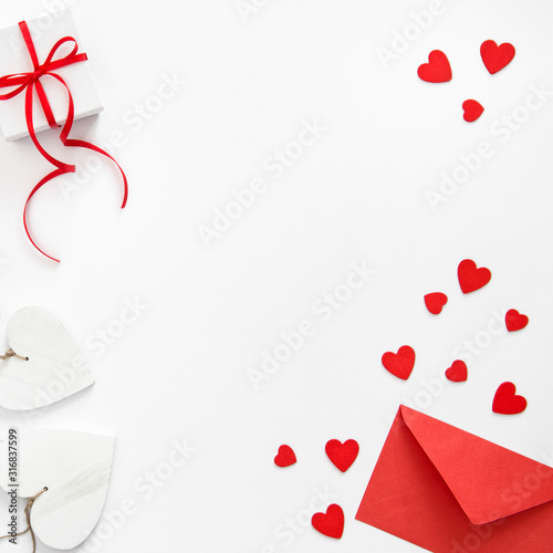 Gift box hearts decoration red envelope Valentines Day flat lay