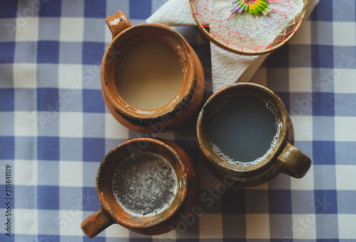 Teotihuacan, Mexico -May 2019 Pulque is an alcoholic beverage made from the fermented sap of the maguey (agave) plant. It is traditional to central Mexico photo