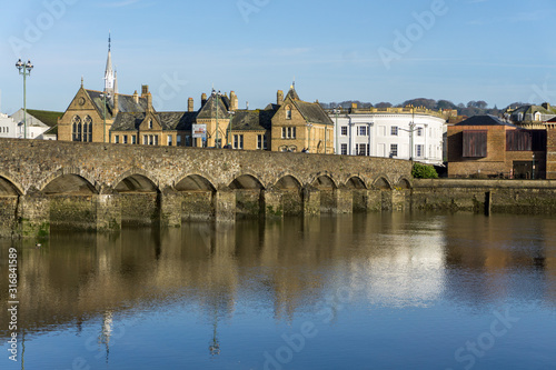 Barnstaple medieval long bridge built in the 13th century spanning the River Taw in North Devon , England. 