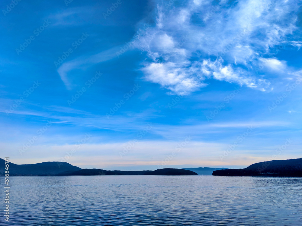 View of a vibrant blue sky above the San Juan Islands