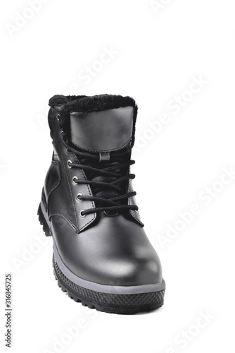 Winter male black leather boot on a white background, hiking shoes, practical off-road shoes, close-up