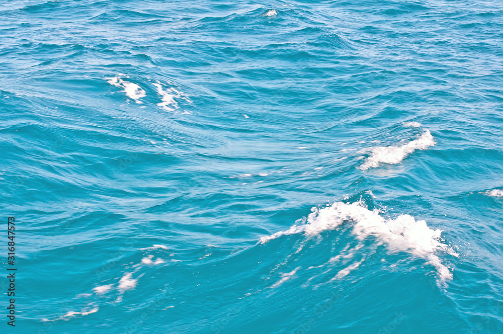 Fototapeta premium beautiful clear sea, soft waves, close up, no focus