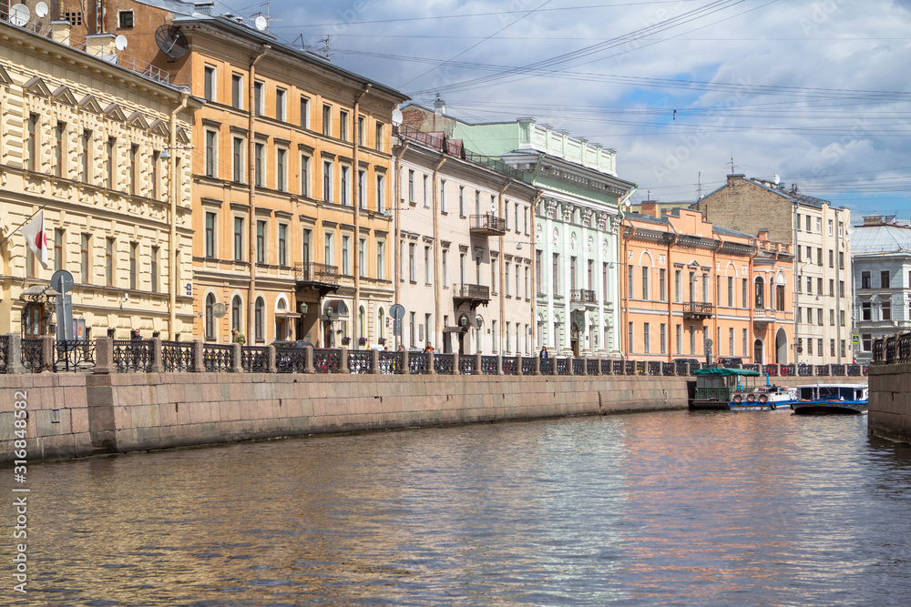 Buildings on waterfront of St. Petersburg summer day, Russia