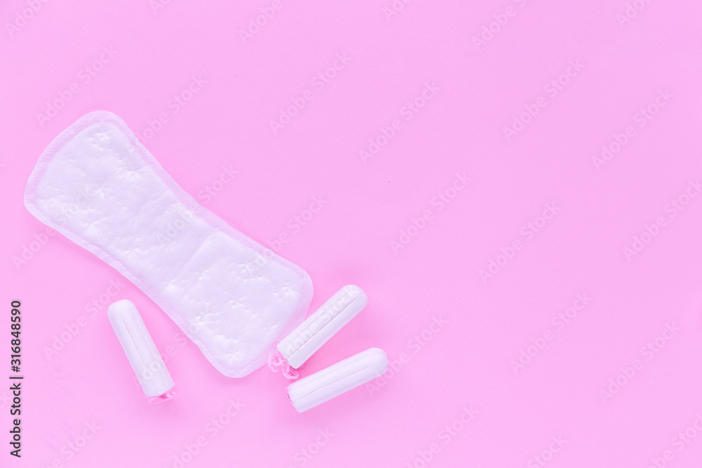 Daily pad and swab on a pink background Daily pad and swab on a pink background