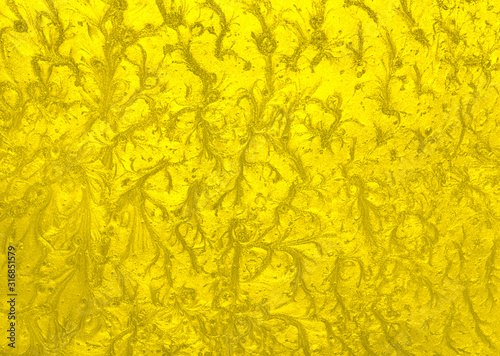 Liquid acrylic luxury golden background with abstract excellent pattern.