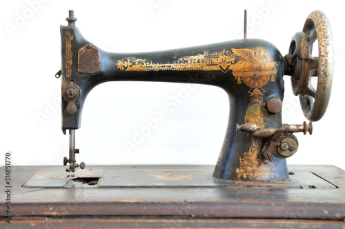 old singer sewing machine isolated on white background