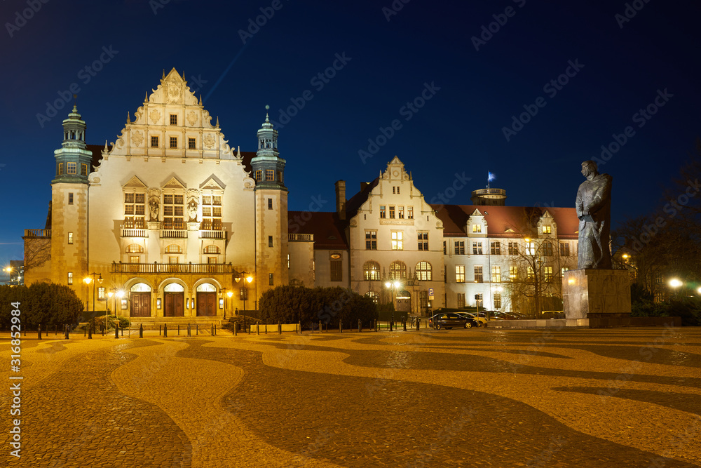 Neorenaissance facade of the building of the university auditorium at night in Poznan.