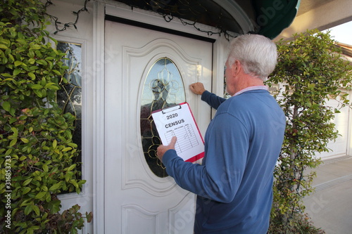 Man taking census, door to door photo