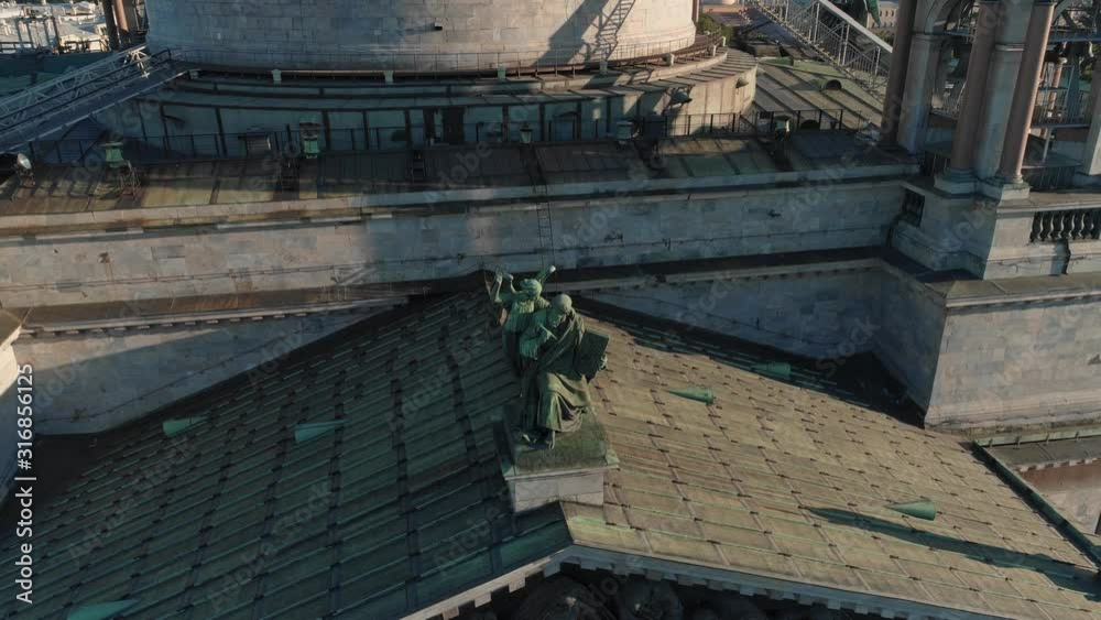 Saint-Petersburg, Russia. June 2019: Aerial close up view of sculpture at Isaac cathedral roof in Saint-Petersburg Saint-Petersburg, Russia. June 2019: Aerial close up view of sculpture at Isaac cathedral roof in Saint-Petersburg