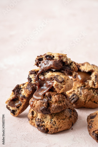 chocolate chunk cookies stuffed with melted caramel photo