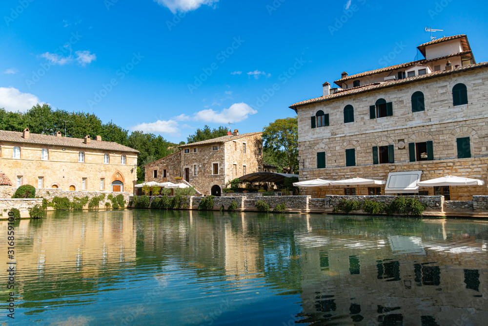 Antique thermal baths in the medieval village Bagno Vignoni, Tuscany, Italy