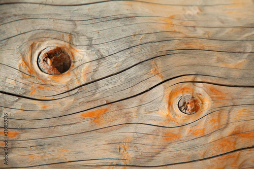 Abstract image of old colourful rich wood background as a symbol of men and women.
