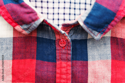 Plaid Material Shirt Background. Front of Shirt Elements: pocket, collar, buttons as Background