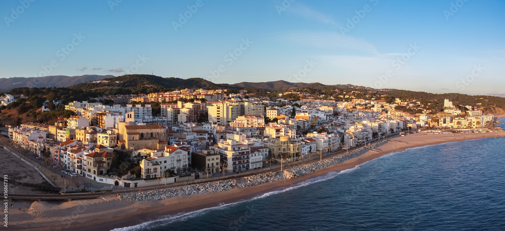Aerial panoramic view of Sant Pol de Mar village in el Maresme coast, Catalonia.