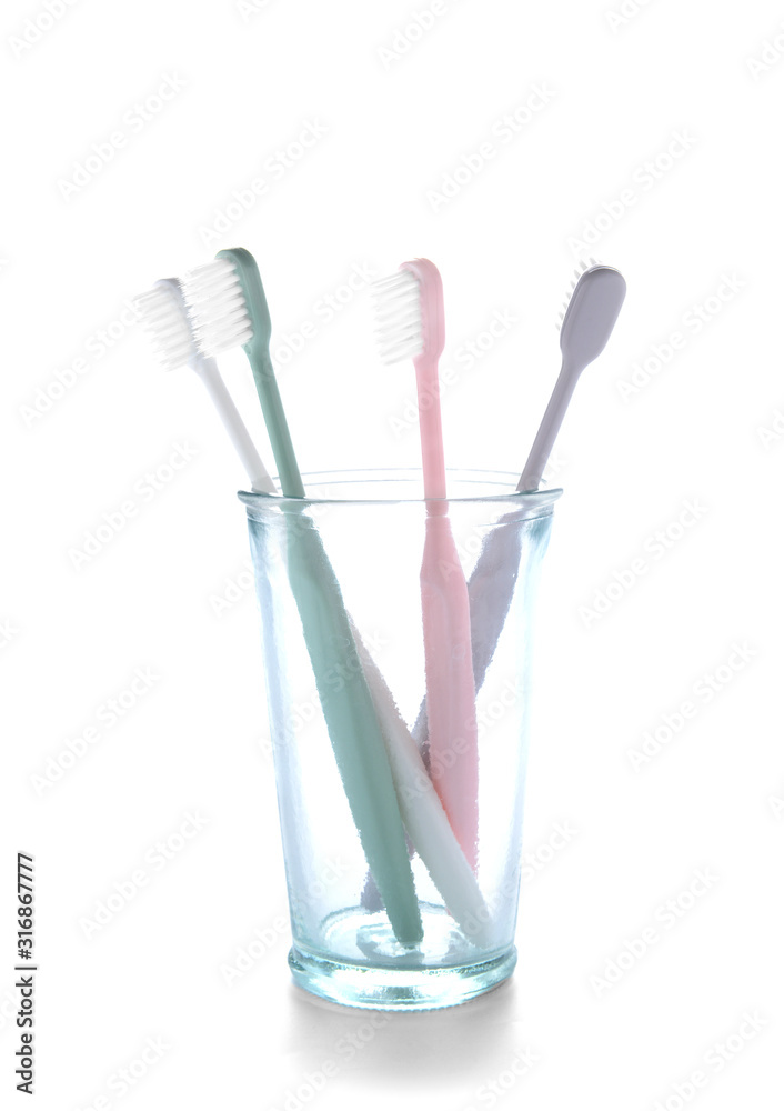 Holder with tooth brushes on white background Holder with tooth brushes on white background