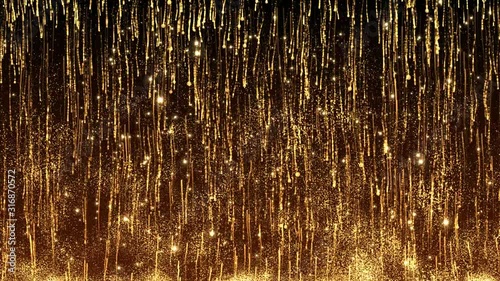 This motion graphics video shows gold particles falling and re-taking off, sparkling against a dark background in a spectacular light show.