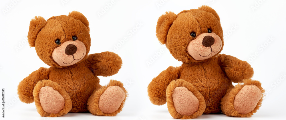Fototapeta premium cute brown little vintage teddy bear sitting on a white background