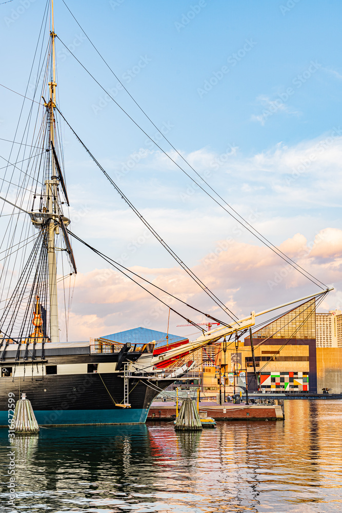 Baltimore, Maryland, US - September 4, 2019 View of Baltimore Harbor with USS Constellation Ship and office buildings Baltimore, Maryland, US - September 4, 2019 View of Baltimore Harbor with USS Constellation Ship and office buildings