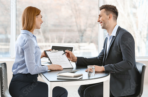 Tableau sur toile Bank manager working with man in office