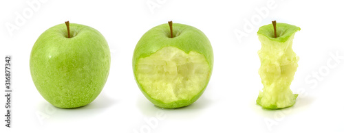 Ein ganzer Apfel, ein Apfel mit Biss und die Reste eines Apfel nach dem Verzehr