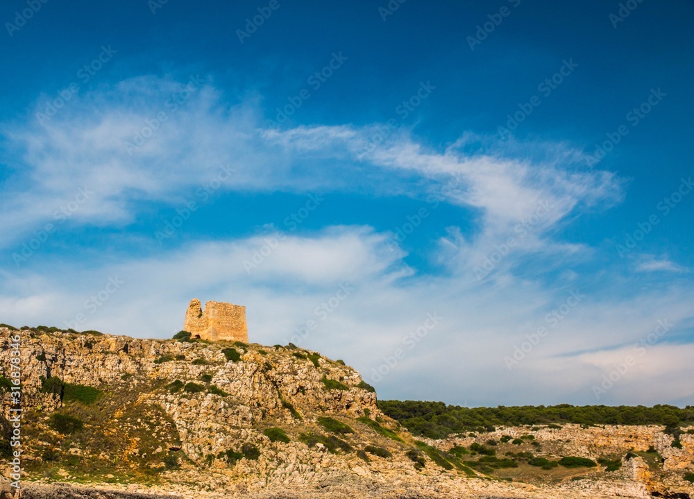 Watchtower near ionian sea (Uluzzo tower in Porto Selvaggio) Apulia, Salento, Italy