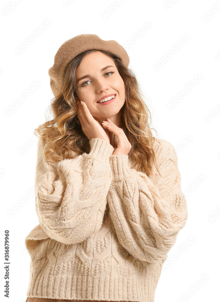Beautiful young woman in warm sweater on white background Beautiful young woman in warm sweater on white background