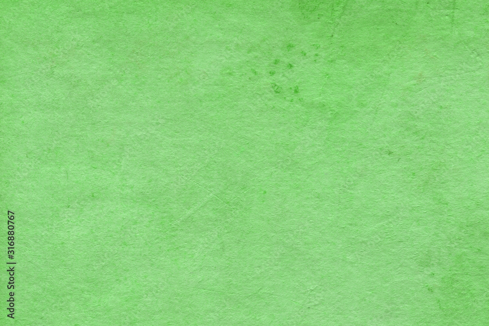 Cardboard green abstract pattern texture close-up. Retro old paper background. Grunge concrete wall. Vintage blank wallpaper. Cardboard green abstract pattern texture close-up. Retro old paper background. Grunge concrete wall. Vintage blank wallpaper.