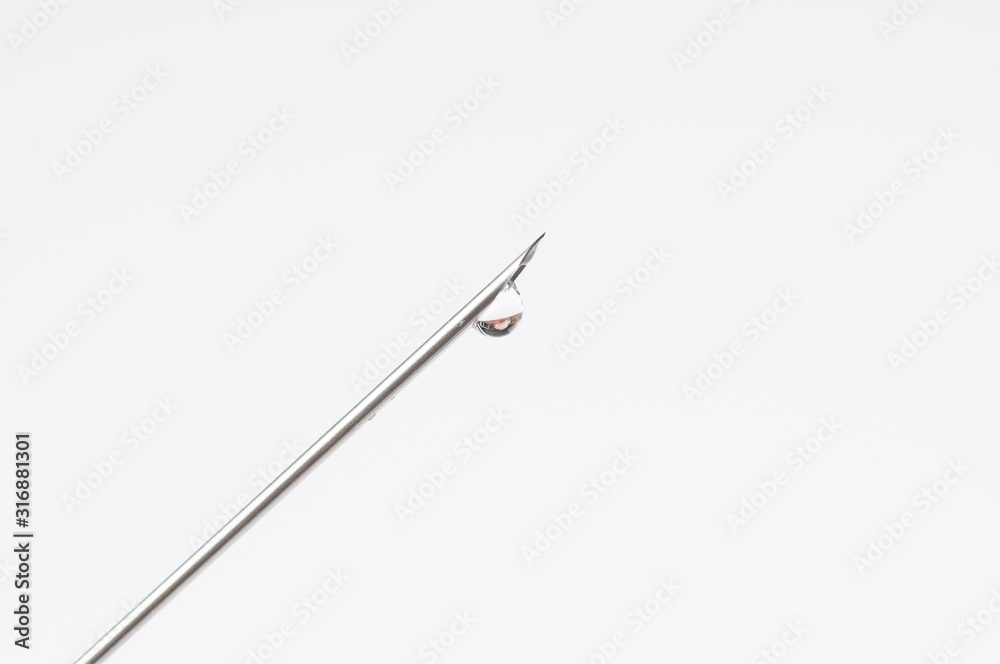 Syringe and needle isolated on white background.Copy space Syringe and needle isolated on white background.Copy space