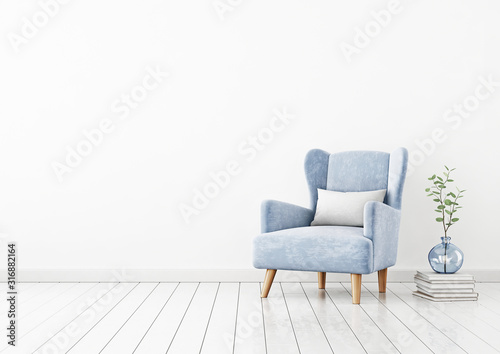 Living room interior wall mockup with blue velvet armchair, white pillow, pile of books and green plant branches in vase on empty white wall background. 3D rendering, illustration.