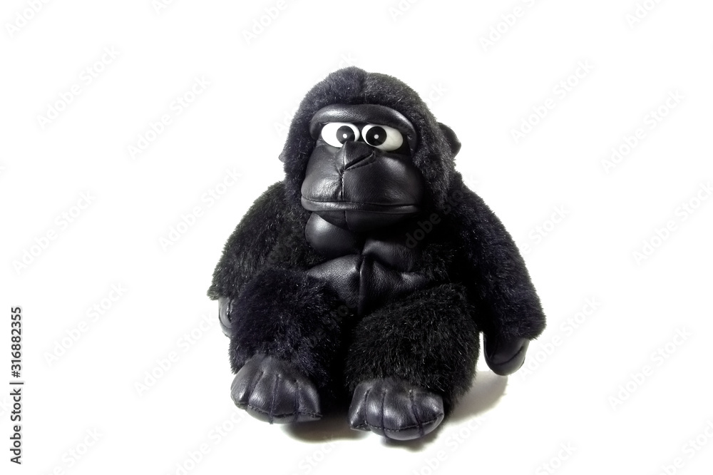 Toy Gorilla isolated on a white background. Monkey clouse-up.     