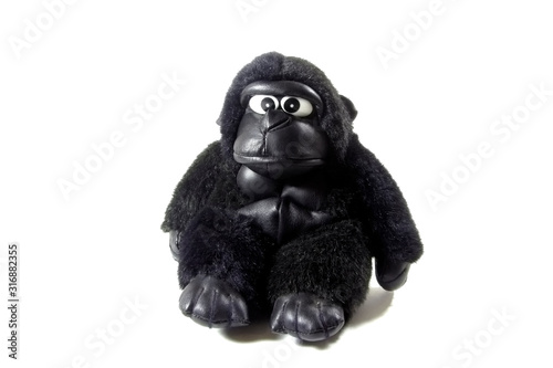 Toy Gorilla isolated on a white background. Monkey clouse-up. 