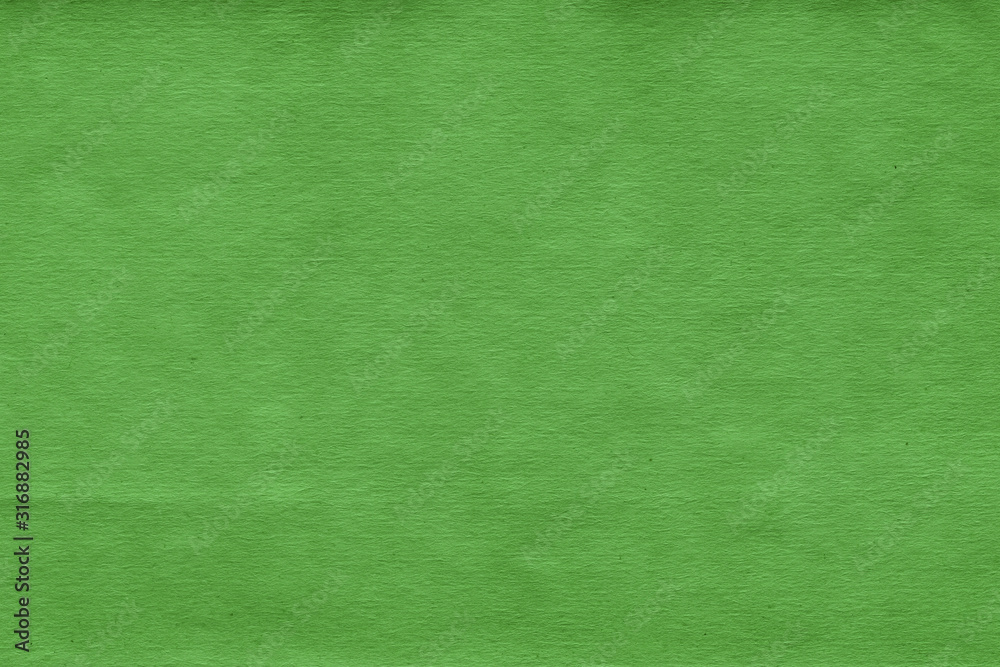 Cardboard green abstract pattern texture close-up. Retro old paper background. Grunge concrete wall. Vintage blank wallpaper. Cardboard green abstract pattern texture close-up. Retro old paper background. Grunge concrete wall. Vintage blank wallpaper.